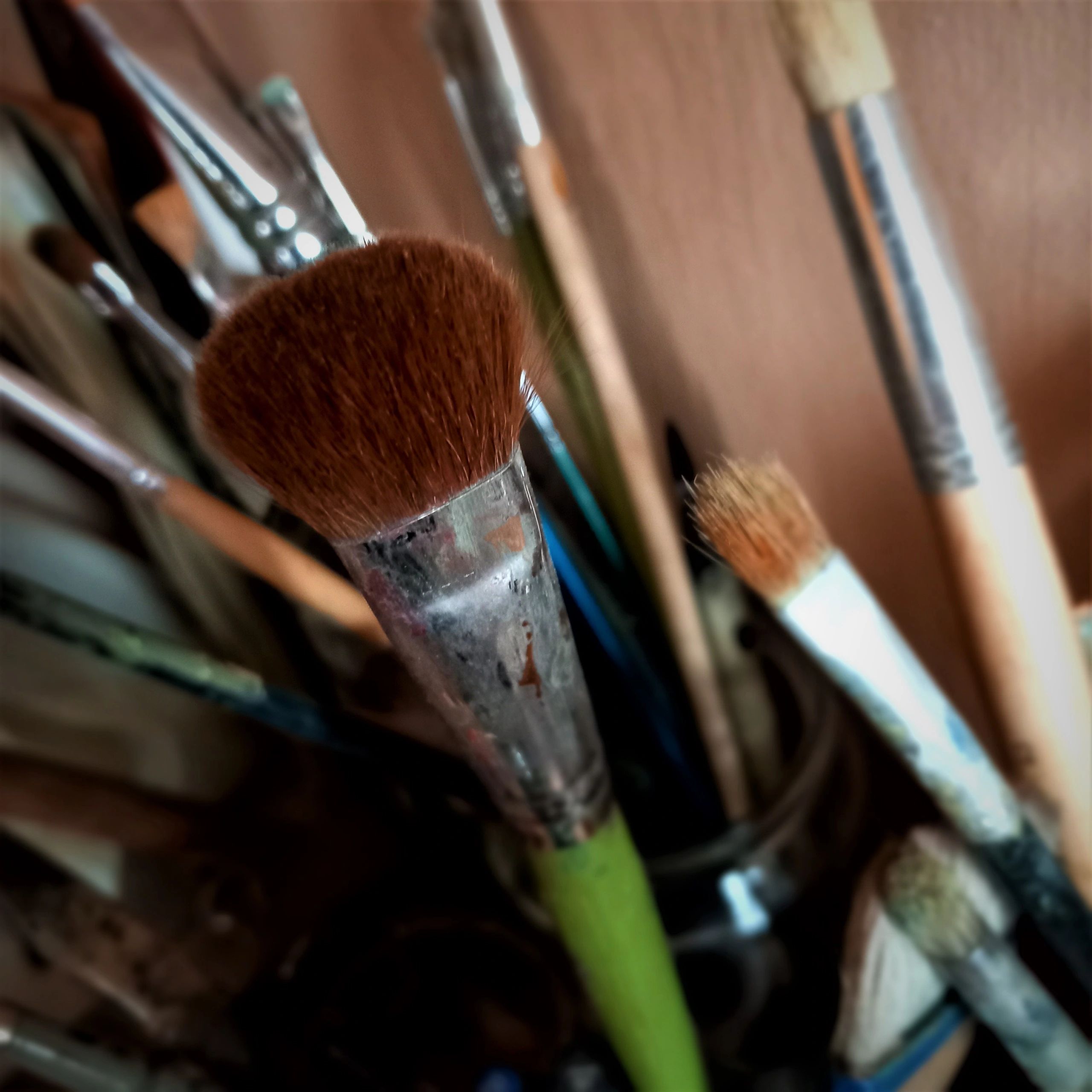 Close-up of paintbrushes used for studio sessions