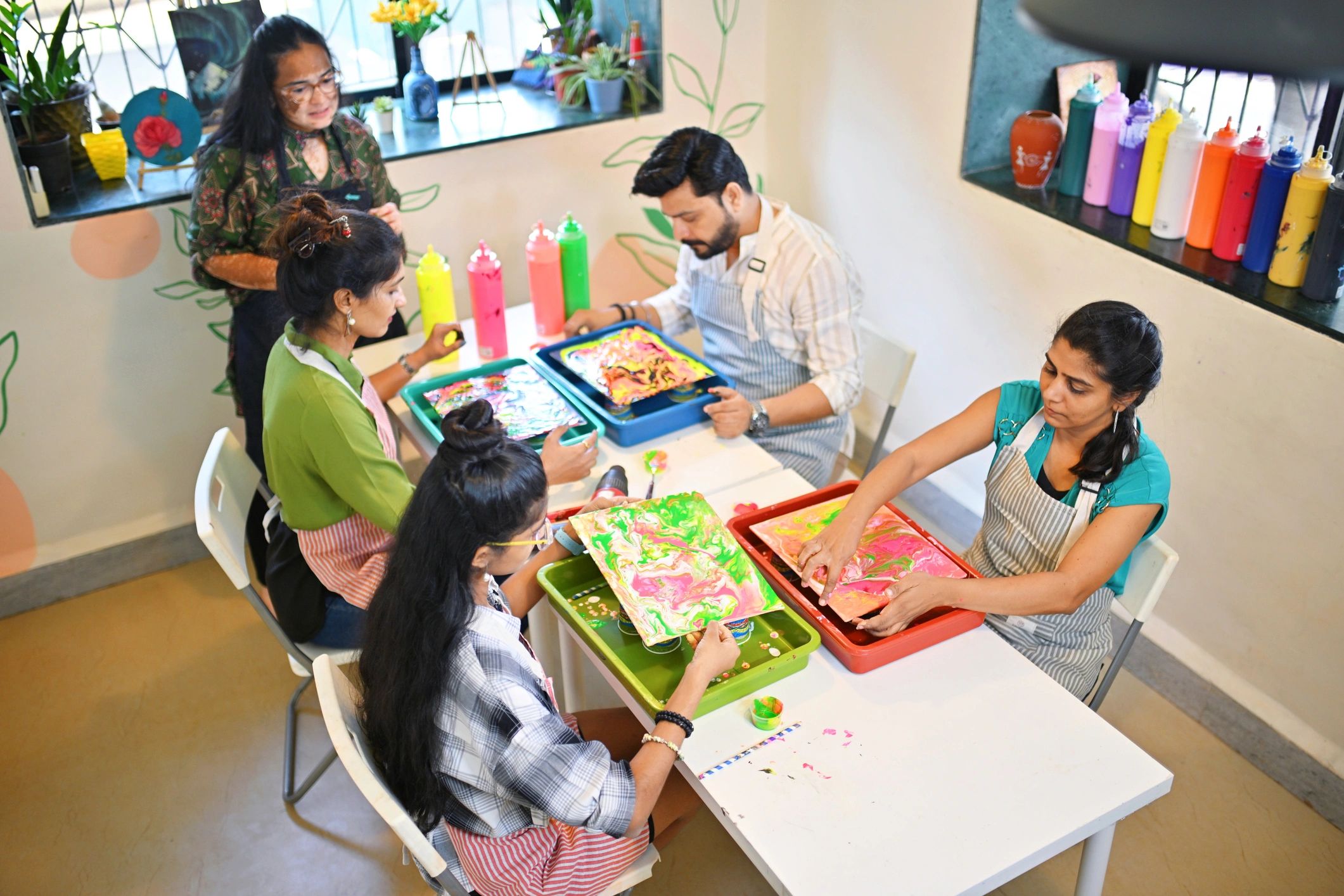 Group enjoying a painting session together