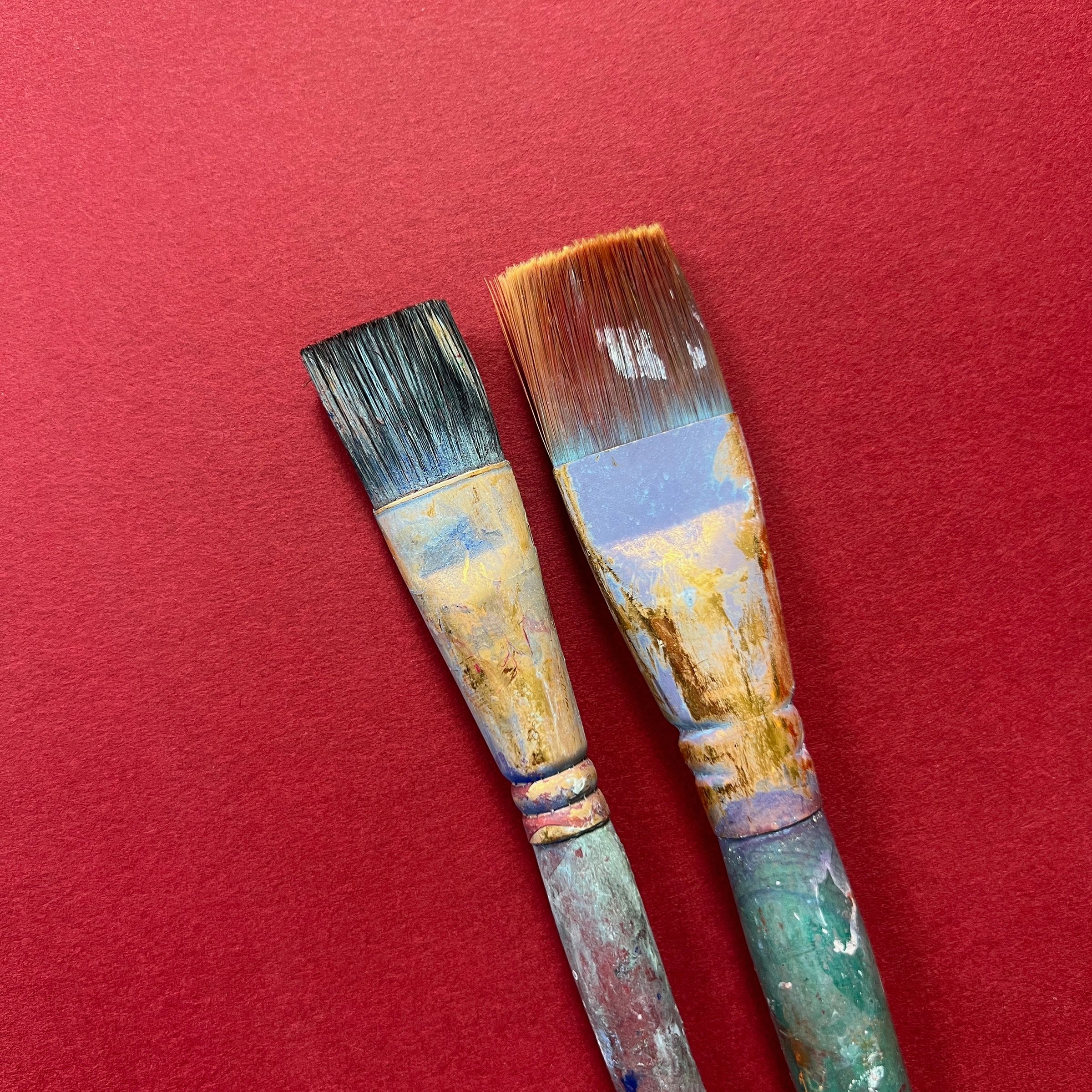 Paintbrushes arranged as studio tools detail